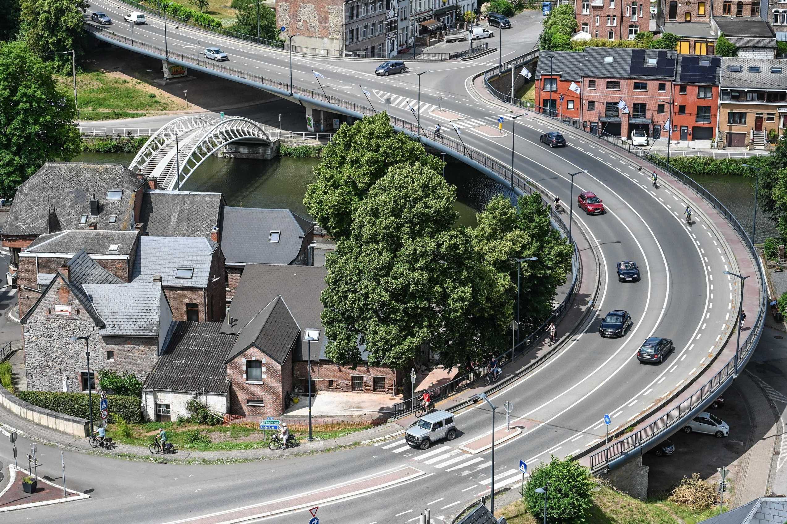 Aerial view of Wallonia Thuin Sambre with cars driving on bridge to highlight importance of car rental excess insurance.